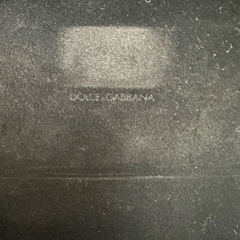 Dolce & Gabbana Black semi hard glass case and dust bag holder